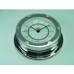  UHR ODYSSEA CHROM Serie A105 Edelstahl Odyssea<BR>Elegantes und solides Edelstahlgeh�use.<BR> 
Abm.: Glas � 100mm, Wandplatten � 125mm, H�he 50mm.<BR>Uhr
